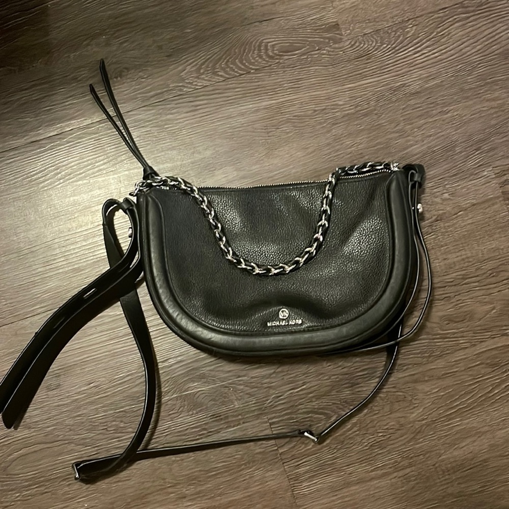 Michael Kors black and silver zip purse with chain. 2 pockets inside